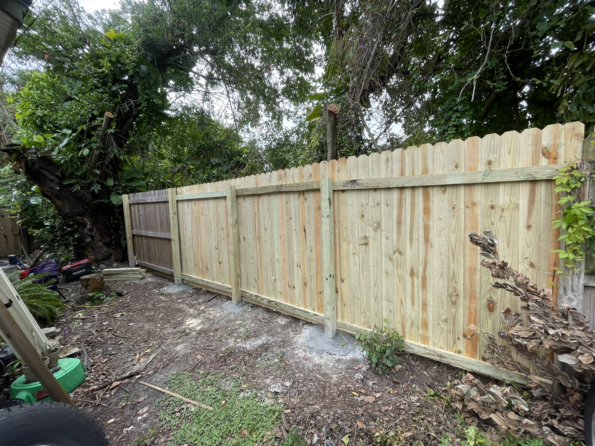 New wood privacy fence installation